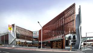 The visual rhythm of the steel blades draws the eye into the south-facing entrance of the building, which is located on a significant gateway site in Wollongong's CBD
